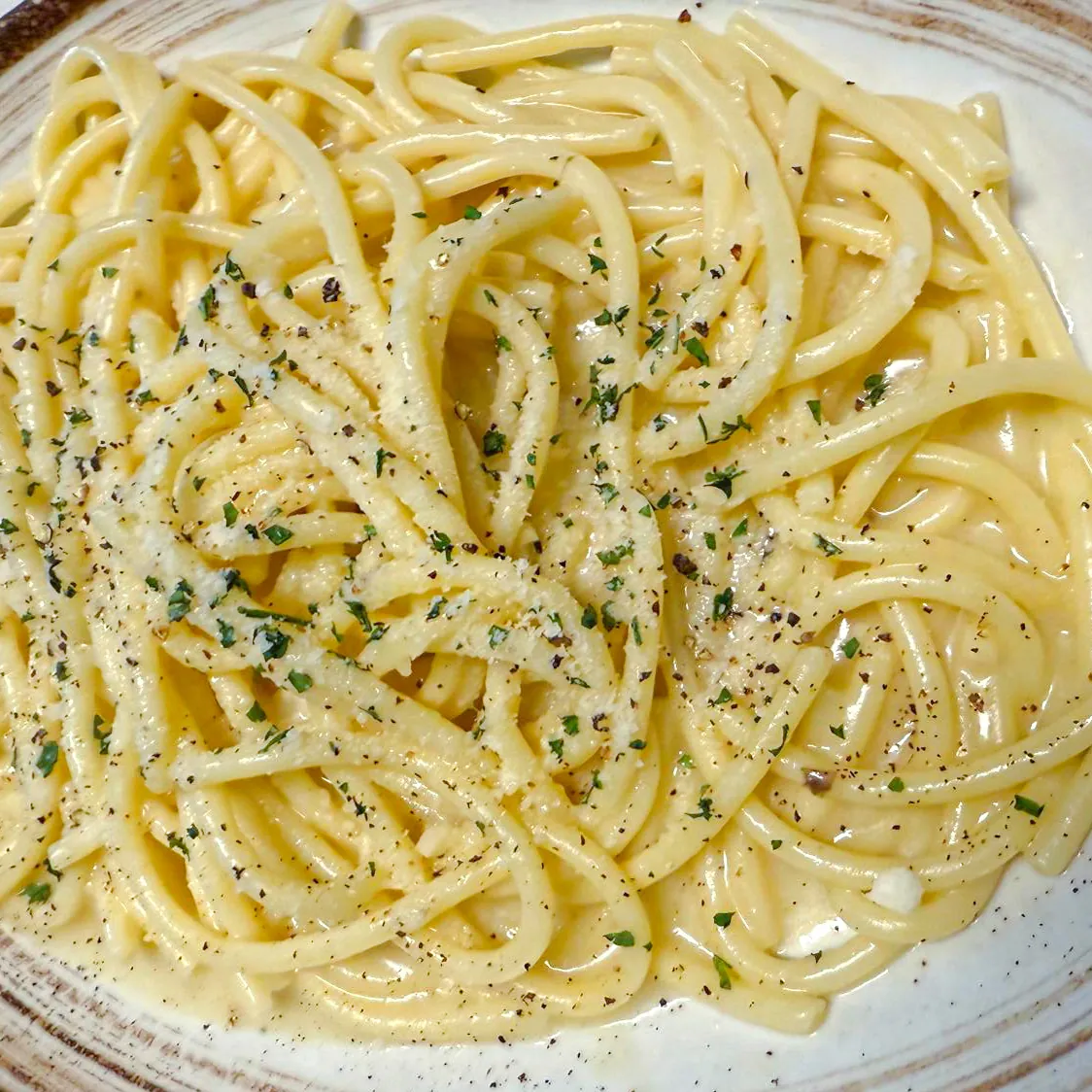 Cacio e Pepe with pecorino and cracked black pepper
