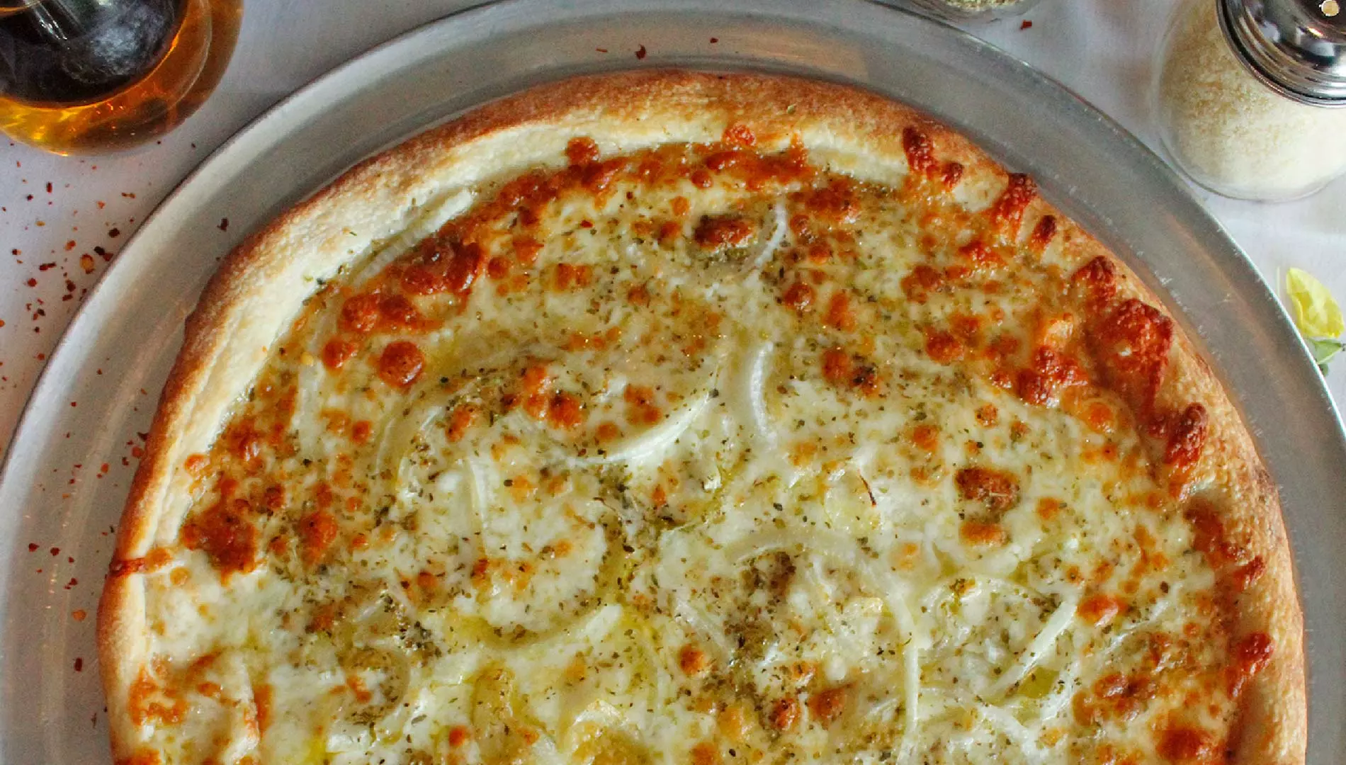 A New York style pie overhead at Di Papa's